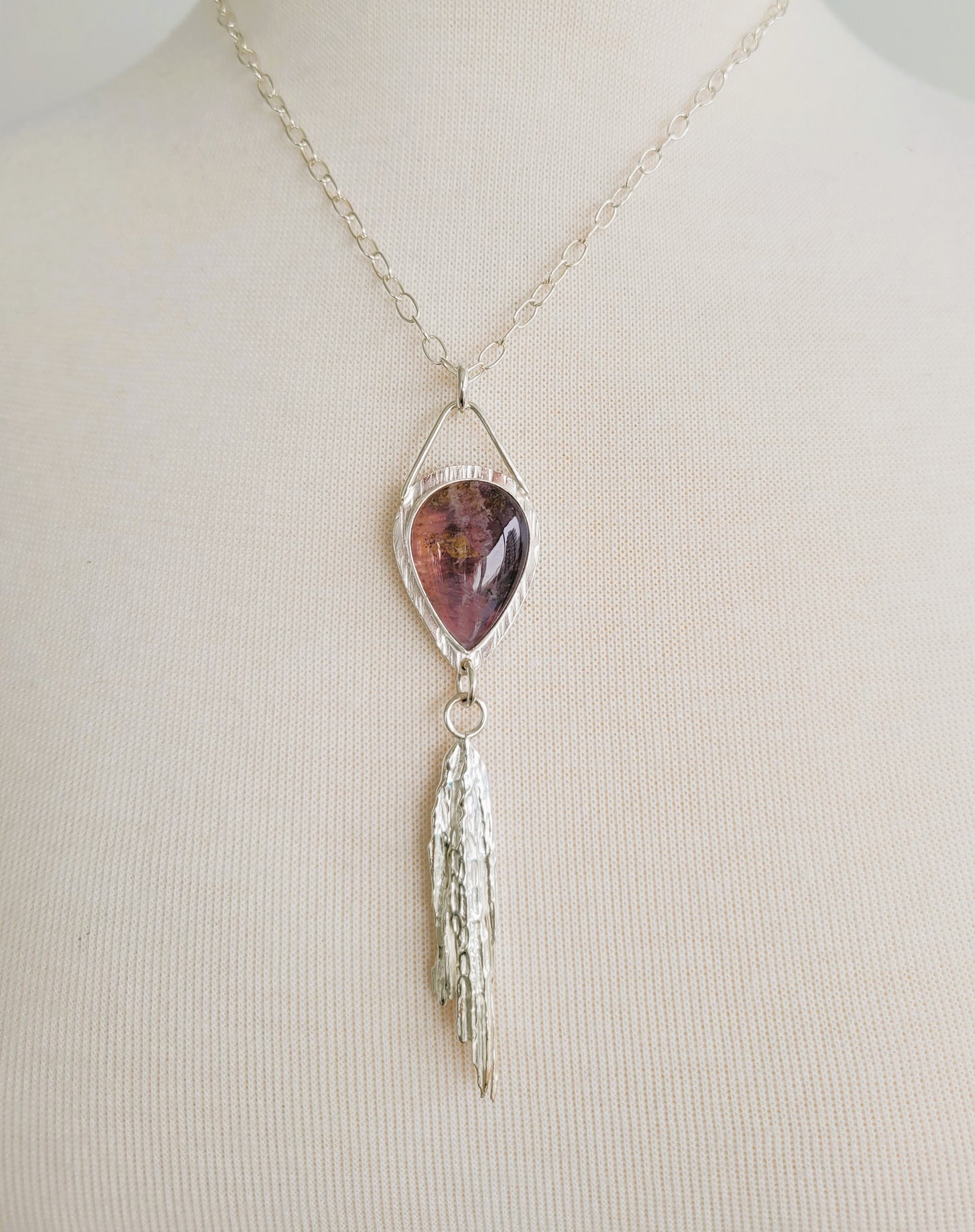 Fluorite and broom casting pendant