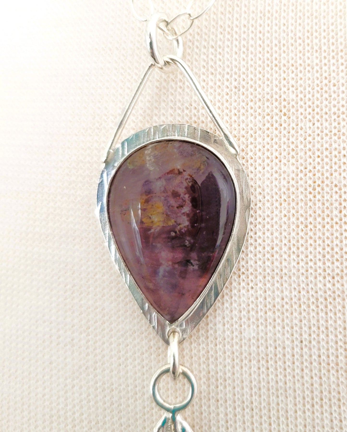 Fluorite and broom casting pendant