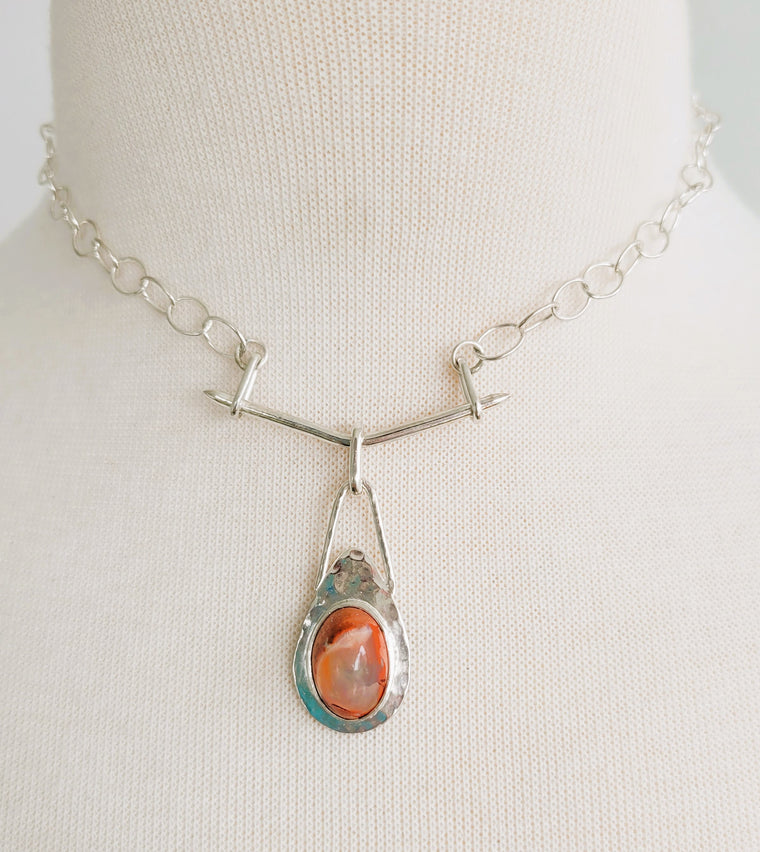 Oval mexican opal on hammered pendant